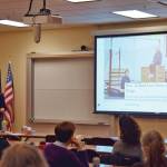 Southern Kenai Peninsula Resilience Coalition youth project manager Anna Meredith explains the history of the Icelandic prevention model at the Planet Youth Homer event hosted Thursday, Jan. 6, 2025, at Kachemak Bay Campus in Homer, Alaska. The collaborative community project is aimed at providing parents and caregivers the resources and information to help support Homer area youth. (Chloe Pleznac/Homer News)