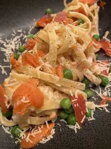 Creamy pasta is served with smoked salmon and Parmesan. (Photo by Tressa Dale/Peninsula Clarion)