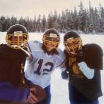 Homer High School girls dressed as the football team at the first-ever Homer Ski for Women event in the DOT lot on Baycrest in 2004. Aderhold is in the white jersey, center. Alina Rykaczewski is on the left with Kristin Vantrease on the right. (Photo courtesy of Kasey Aderhold)