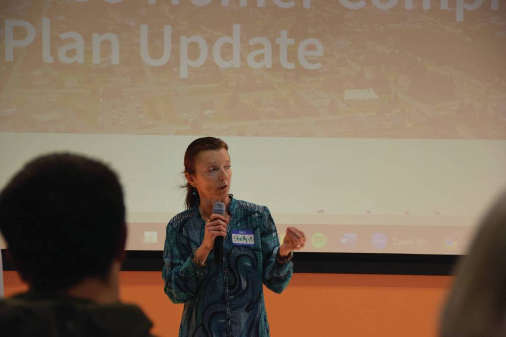Agnew::Beck project consultant manager Shelly Wade explains the public comment process and timeline for the draft 2035 comprehensive plan during an open house event on Tuesday, Feb. 11<ins>, 2025,</ins> at the Alaska Maritime National Wildlife Refuge Visitor Center<ins> in Homer, Alaska</ins>. (Delcenia Cosman/Homer News)