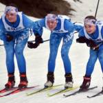 Soldotnas Ariana Cannava, Tania Boonstra and Kate Cox approach the finish line in the lead of the 4-kilometer freestyle girls race at the Kenai Peninsula Borough meet Saturday, February 15, 2025, at Tsalteshi Trails just outside of Soldotna, Alaska. (Photo by Jeff Helminiak/Peninsula Clarion)