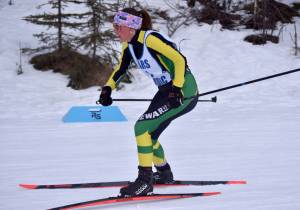 Sewards Indigo Leslie approaches the finish of the 4-kilometer girls race at the Kenai Peninsula Borough meet Saturday, February 15, 2025, at Tsalteshi Trails just outside of Soldotna, Alaska. (Photo by Jeff Helminiak/Peninsula Clarion)