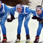 Soldotna's Ariana Cannava, Tania Boonstra and Kate Cox approach the finish line in the lead of the 4-kilometer freestyle girls race at the Kenai Peninsula Borough meet Saturday, February 15, 2025, at Tsalteshi Trails just outside of Soldotna, Alaska. (Photo by Jeff Helminiak/Peninsula Clarion)