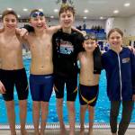 The Kachemak Swim Club team poses for a picture at the Alaska Swimming Age Group Championships on Feb. 14, 2025 in Fairbanks, Alaska. (Photo courtesy of Eric Sundheim)