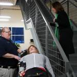 Paul Perry, assistant professor of paramedic technology, speaks to University of Alaska Anchorage Provost Denise Runge at a showcase of Kenai Peninsula Colleges career and technical education programs in the colleges Career and Technical Center in Soldotna, Alaska, on Thursday, Feb. 20, 2025. (Jake Dye/Peninsula Clarion)