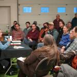 Syverine Bentz, coastal training program coordinator for the Kachemak Bay Research Reserve, speaks during a Local Solutions meeting focused on salmon at the Cook Inletkeeper Community Action Studio in Soldotna, Alaska, on Monday, Feb. 10, 2025. (Jake Dye/Peninsula Clarion)
