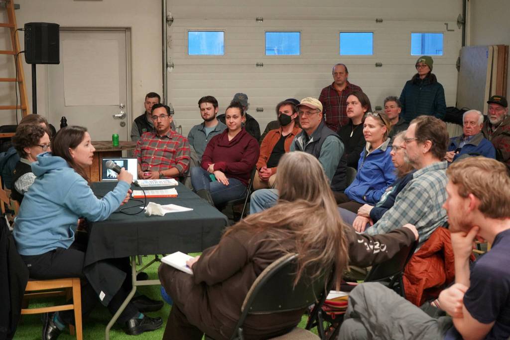 Syverine Bentz, coastal training program coordinator for the Kachemak Bay Research Reserve, speaks during a Local Solutions meeting focused on salmon at the Cook Inletkeeper Community Action Studio in Soldotna, Alaska, on Monday, Feb. 10, 2025. (Jake Dye/Peninsula Clarion)