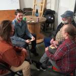 Groups brainstorm possible projects during a Local Solutions meeting focused on salmon at the Cook Inletkeeper Community Action Studio in Soldotna, Alaska, on Monday, Feb. 10, 2025. (Jake Dye/Peninsula Clarion)