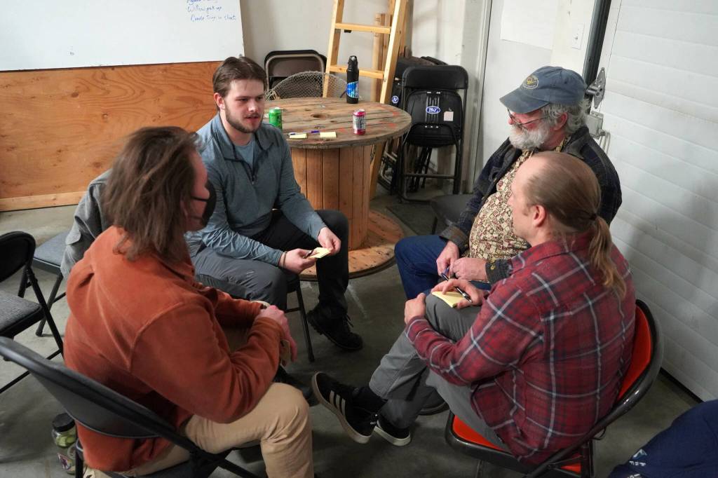 Groups brainstorm possible projects during a Local Solutions meeting focused on salmon at the Cook Inletkeeper Community Action Studio in Soldotna, Alaska, on Monday, Feb. 10, 2025. (Jake Dye/Peninsula Clarion)