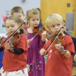 Students perform at the Homer OPUS fundraiser on Wednesday, Feb. 25 at Chapman School in Anchor Point. (Chloe Pleznac/Homer News)