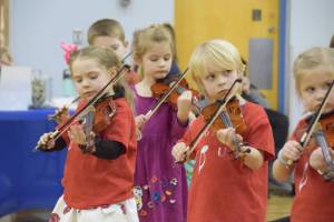 Students perform at the Homer OPUS fundraiser on Wednesday, Feb. 25 at Chapman School in Anchor Point. (Chloe Pleznac/Homer News)