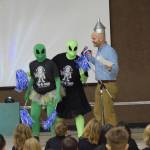 Principal Sean Campbell addresses the friendly aliens as they attempt to communicate despite their language barriers at Paul Banks Elementary School on Feb. 28, 2025. (Chloe Pleznac/Homer News)