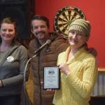 Amber Corey Pointer (right), recipient of the Citizen of the Year award, poses with Anchor Point Chamber of Commerce president Dawson Slaughter and vice president Erin Jerde during the Community Awards announcements on Saturday, March 1<ins>, 2025,</ins> in Anchor Point<ins>, Alaska</ins>.
