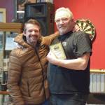 Photos by Delcenia Cosman/Homer News
Anchor Point Chamber of Commerce president Dawson Slaughter (center) presents the Golden Deed Award to Post Cmdr. Chuck Collins on behalf of the Virl Pa Haga VFW Post 10221 during the Community Awards announcements on Saturday, March 1<ins>, 2025,</ins> in Anchor Point<ins>, Alaska</ins>.
