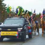 Photos by Delcenia Cosman/Homer News
A truck plays on a No-Snow Rondi theme with a banner and craft palm trees during the Snow Rondi parade on Saturday, March 1<ins>, 2025,</ins> in Anchor Point<ins>, Alaska</ins>.