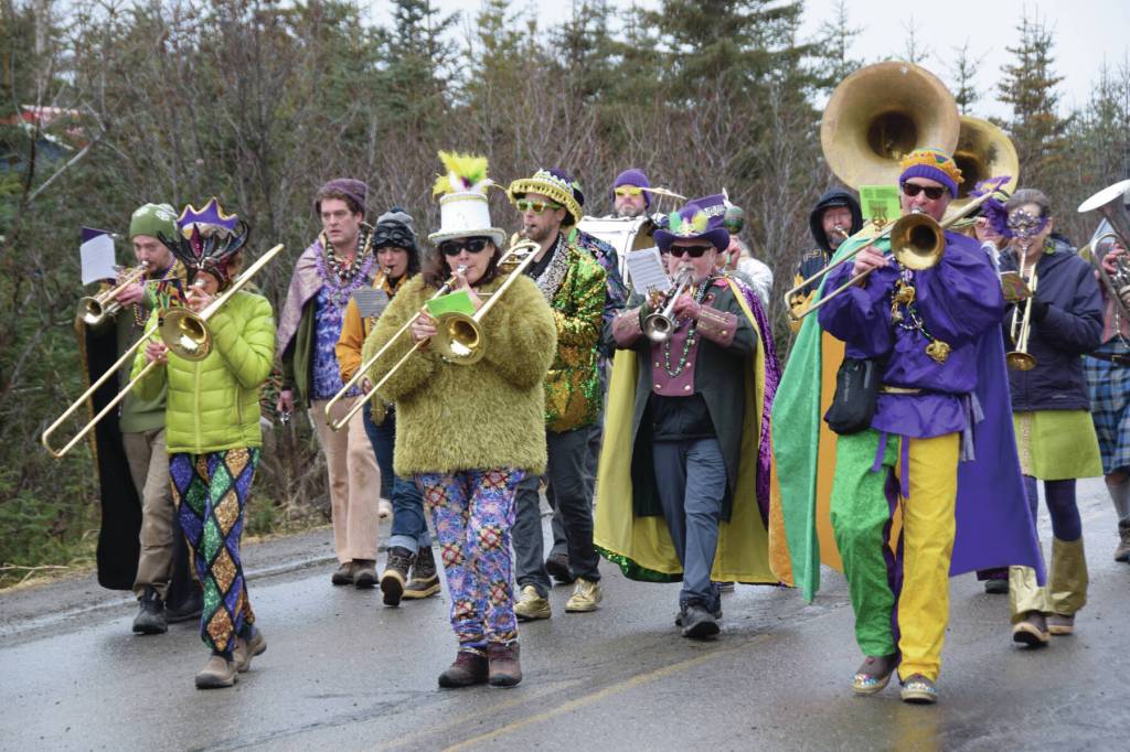 Musicians for the Krewe of Gambrinus play Walking on Sunshine as they march in the Snow Rondi parade on Saturday, March 1<ins>, 2025,</ins> in Anchor Point<ins>, Alaska</ins>.