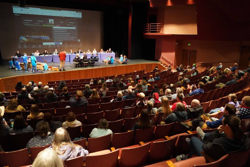 Around 100 people fill seats during a meeting of the Kenai Peninsula Borough School Districts Board of Education in Homer, Alaska, on Monday, March 3, 2025. (Jake Dye/Peninsula Clarion)
