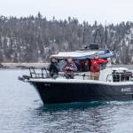 A group of volunteers during the 2024 K-Bay Sea Duck Survey. Two boats duplicate the same survey in the same area at the same time to help ensure accuracy. (Photo courtesy of Bjorn Larson)