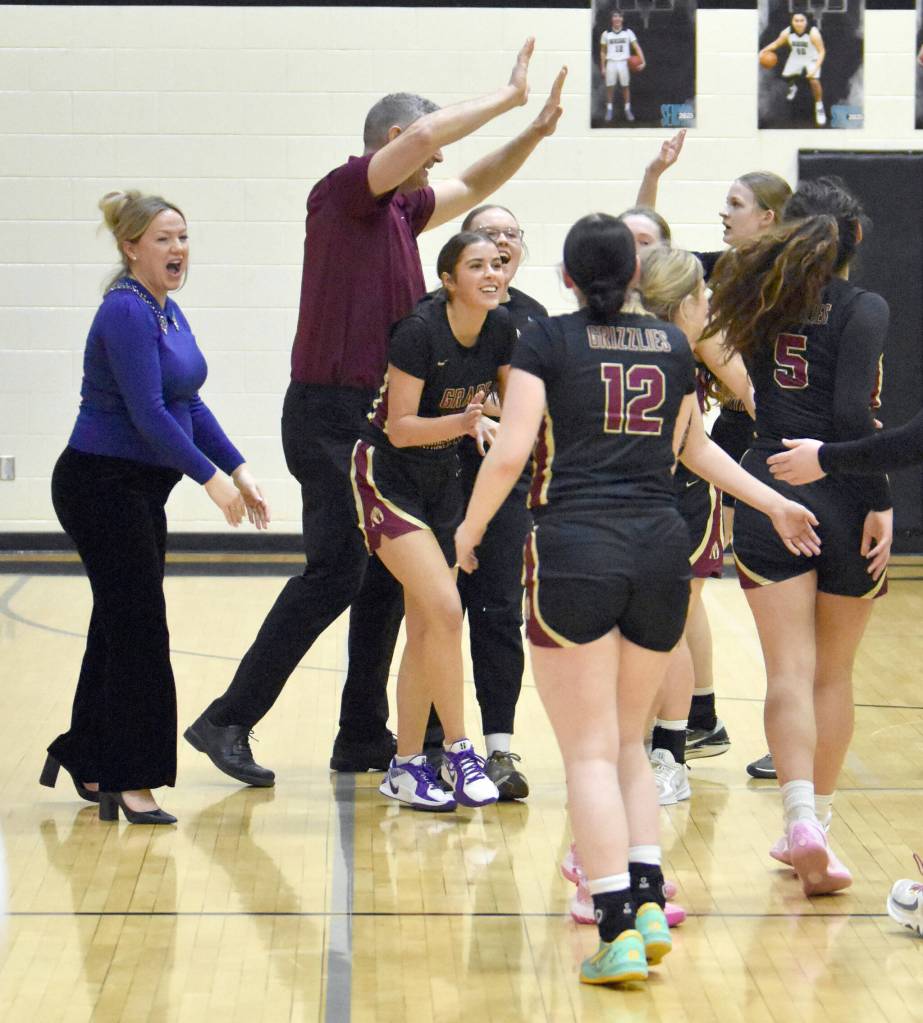 Grace Christian celebrates winning the championship Saturday, March 8, 2025, at the Peninsula Conference tournament at Nikiski Middle-High School in Nikiski, Alaska. (Photo by Jeff Helminiak/Peninsula Clarion)
