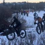 Bicyclists race around a corner during the 2025 Homer Epic fundraiser for the Homer Cycling Club. (Photo courtesy of Jake Schlapfer)