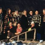 During her brief time on the southern Kenai Peninsula, Dorothy Miller, wife of Cecil Greasy Miller, was a part of the Anchor Point Homemakers Club. Here, Dorothy (far left, standing) joins fellow area homemakers for a 1950 group shot. Sitting on the sled, in the red blouse, is Dorothys daughter, Evelyn, known as Evie. (Photo courtesy of the Pratt Museum)