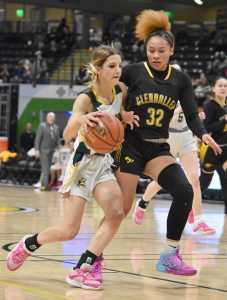 Sewards Ava Jagielski drives on Glennallens Brejanay Stone-Jordan at the Class 2A girls state championship game Saturday, March 15, 2025, at the Alaska Airlines Center in Anchorage, Alaska. (Photo by Jeff Helminiak/Peninsula Clarion)