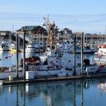 The Naushon sits in the Homer Harbor during its decommissioning ceremony on Friday, March 21, 2025, on Freight Dock Road on the Homer Spit in Homer, Alaska. (Chloe Pleznac/Homer News)