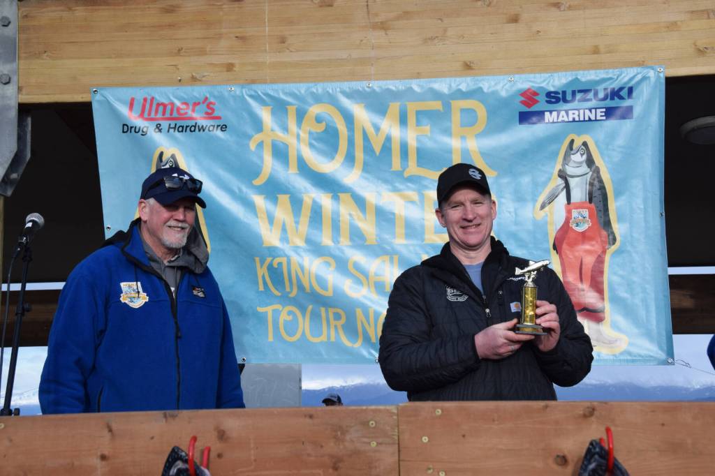 Jeff Laughlin poses with his fifth-place trophy during the 2025 Homer Winter King Salmon Tournament on Saturday, March 22, 2025, at the Deep Water Dock on the Homer Spit in Homer, Alaska. (Delcenia Cosman/Homer News)