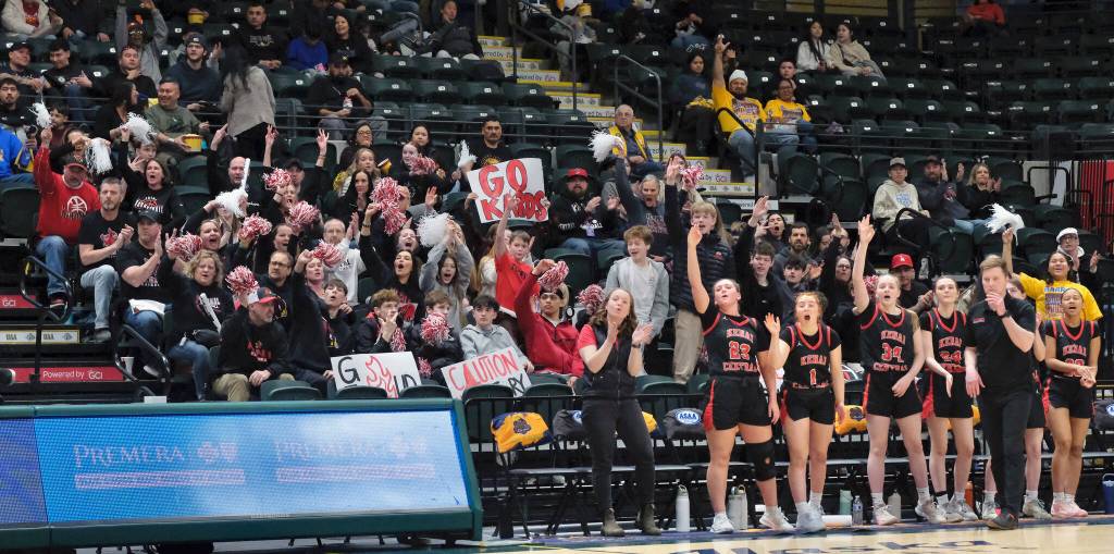 Kenai fans respond to a 3-point shot against Grace Christian during the Kardinals semifinal loss to the Grizzlies on Thursday, March 20, 2025, in the 2025 ASAA March Madness Alaska 3A/4A Basketball State Championships at the Alaska Airlines Center in Anchorage, Alaska. (Klas Stolpe / Juneau Empire)