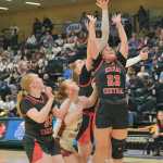 Kenais Ellsi Miller (33), Willow Graham (32) and McKenzie Spence (23) go for a rebound with Grace Christians Madeline Ayers (left) and Sophie Lentfer (behind) during the Kardinals semifinal loss to the Grizzlies on Thursday, March 20, 2025, in the 2025 ASAA March Madness Alaska 3A/4A Basketball State Championships at the Alaska Airlines Center in Anchorage, Alaska. (Klas Stolpe / Juneau Empire)
