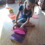 Rosie Mahowald creates tissue paper flowers that will be available in Ptarmigan Arts weekend popup of youth art, held Friday through Sunday, April 4-6, 2025, in Homer, Alaska. Photo provided by Ptarmigan Arts