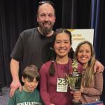Maria Jose Hernandez-Just and her family pose for a photograph after her win on March 21, 2025 at the Wendy Williamson Auditorium at UAA. (Photo courtesy of Francia Lorena Just)