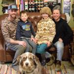 Owners Dahkota Larson and Kait Skundrich sit in a corner of the shop on Friday, March 28, 2025. (Chloe Pleznac/Homer News)