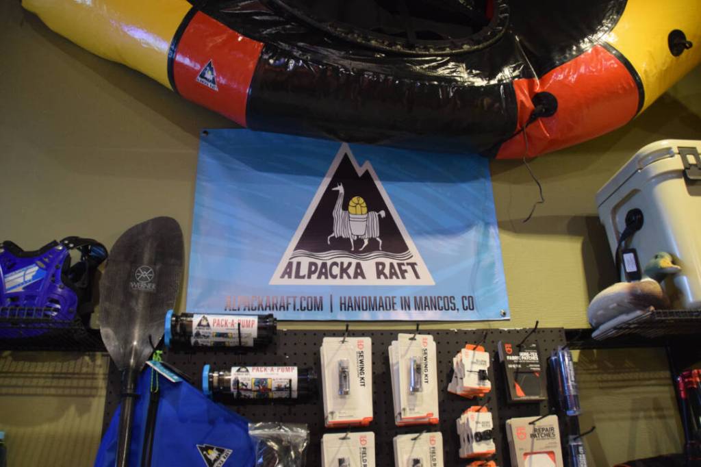 A display of pack rafting supplies line shop walls on Friday, March 28, 2025. The shop will offer pack rafting supplies through Alpacka Raft. (Chloe Pleznac/Homer News)