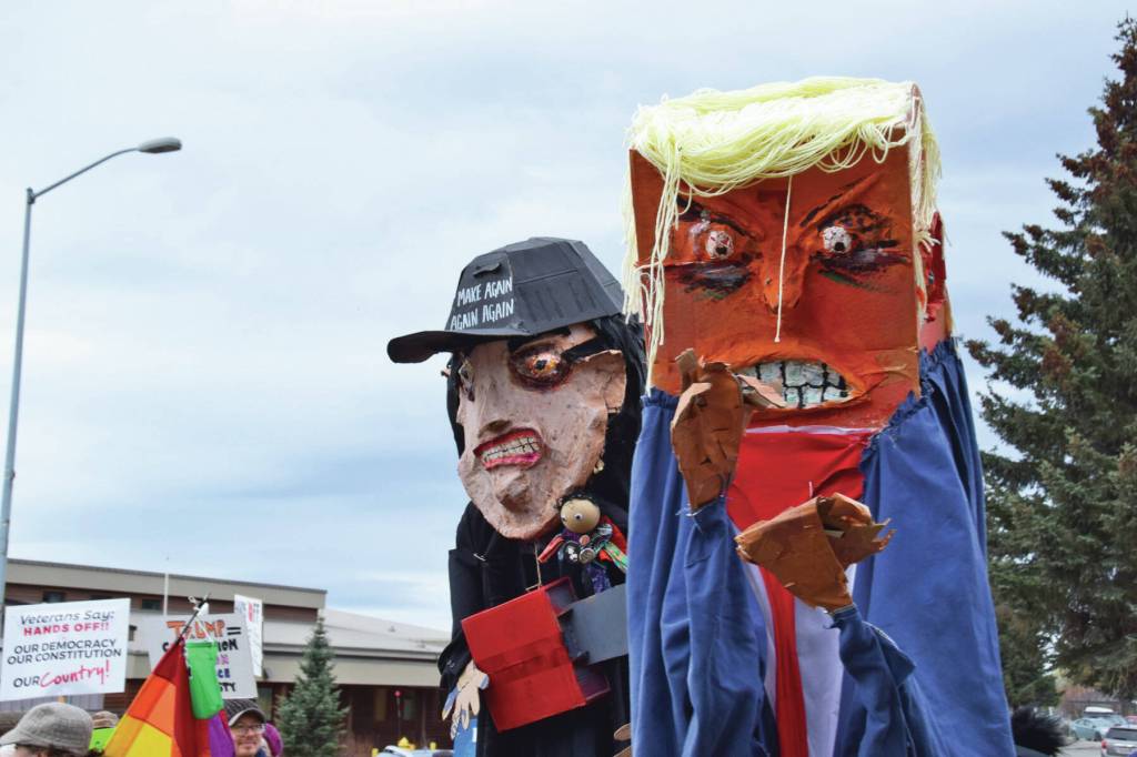 Chloe Pleznac/Homer News
Artist Charles Aguilars puppets arrive at the Hands Off! protest on Saturday, April 5, at WKFL Park in Homer.