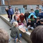 Findlay Kilcher demonstrates his science project in front of other McNeil students during the Science Fair on Friday, April 4. (Chloe Pleznac/Homer News)