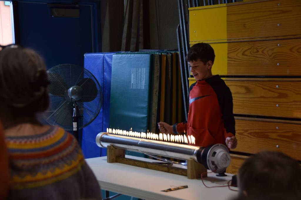 McNeil Canyon Elementary Student Toby Porter presents his Ruben Tube experiment at the Science Fair on Friday, April 4. (Chloe Pleznac/Homer News)