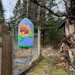 A painted buoy created by Jan Peyton that is in her backyard, similar to what she will be creating during Ready Set Art fundraiser. (Photo provided)