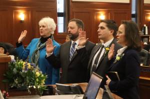 From left: Alaska House Reps. Louise Stutes, R-Kodiak; Bill Elam, R-Nikiski; Justin Ruffridge, R-Soldotna; and Sarah Vance, R-Homer, take the oath of office at the Alaska Capitol on Tuesday, Jan. 21, 2025, in Juneau, Alaska. (Photo by Mark Sabbatini/Juneau Empire)
