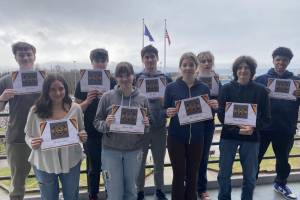 Spring Mariner Way Award honorees stand outside the Homer High School after a celebration in their honor on April 16. Students from top left to right are Ryan Holm, McKenna Black, Liam Young, Gracie High, J.J. Felice, Tilea Lockwood, Willow Hinsberger, Logan Matysczak, and Nik Macauly. (Photo courtesy of Homer High School)