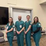 University of Alaska Anchorage, Kachemak Bay Campus nursing students pose for a photo on Wednesday, April 16 after their presentation of paralytic shellfish poisioning. (Chloe Pleznac/Homer News)