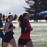 Girls compete in the steeplechase, the first running event of the day on Friday, April 18 at the Homer High School Invitational Track Meet. (Chloe Pleznac/Homer News)
