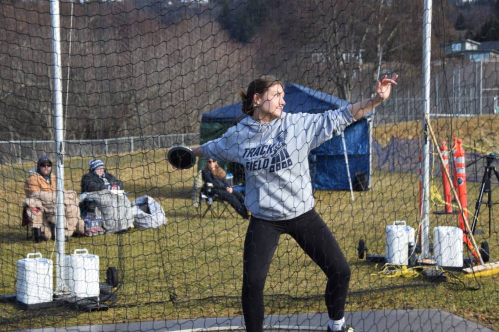 A Soldotna athlete pulls back for her discus throw on Friday, April 18 at the Homer High School Invitational Track Meet. (Chloe Pleznac/Homer News)