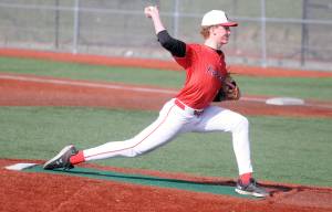 Kenai Centralճ Jacob Joanis delivers a pitch during a high school baseball game against Kodiak on Friday, April 18, at Baranof Field in Kodiak, Alaska. (DEREK CLARKSTON/Kodiak Daily Mirror)