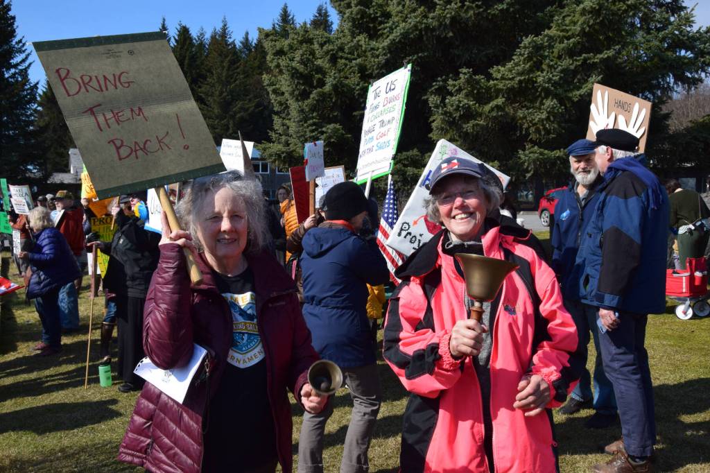 Two Homer women ring bells for freedom on Saturday, April 19 at WKFL Park during the Sustained Resistance, Makes a Difference Rally. (Chloe Pleznac/Homer News)