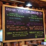 Chloe Pleznac/Homer News
A deli board displays a selection of food options in the Fritz Creek General Store on its reopening day on Thursday, April 24.