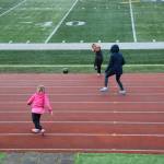 Young soccer fans play ball while they await the start of Saturdays soccer game at the Homer High School athletic field on April 26. (Chloe Pleznac/Homer News)