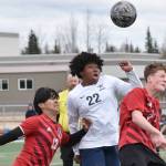 Kenai Central's Enrique Mercado and Carter Felchle battle with Soldotna's Trae Pitsch for the ball Saturday, April 26, 2025, at Ed Hollier Field at Kenai Central High School in Kenai, Alaska. (Photo by Jeff Helminiak/Peninsula Clarion)