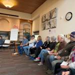 Attendees listen to another person share their thoughts on community-building at the Homer Public Library on Tuesday, April 29. (Chloe Pleznac/Homer News)