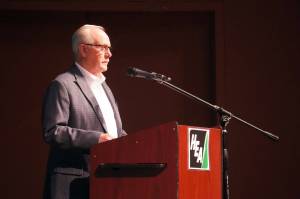 Homer Electric Association Board President Dan Furlong speaks after being reelected at the utilitys annual meeting of the members at Kenai Central High School in Kenai, Alaska, on Thursday, May 1, 2025. (Jake Dye/Peninsula Clarion)